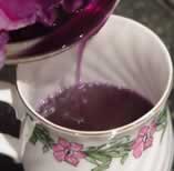 Decant the dye into a cup.
