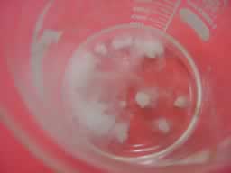 Large granules of calcium carbonate react with acid to produce carbon dioxide. 